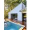 piscine compacte pas chere par Irripiscine by Irrijardin dans un jardin ensoleillée